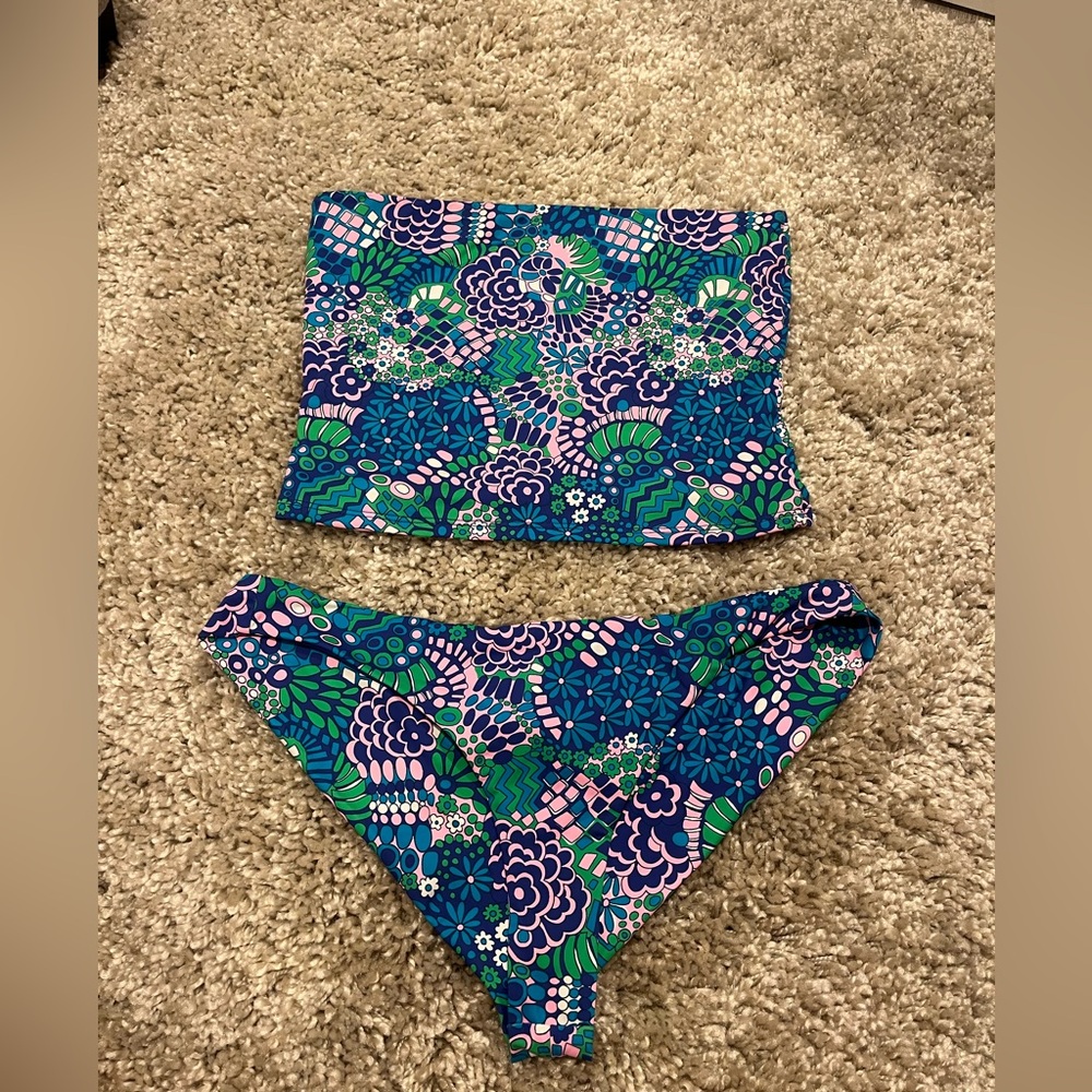 Frankie‘s bikini top is a size medium bottoms are a large